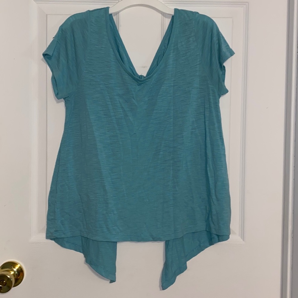Blue shirt with open back